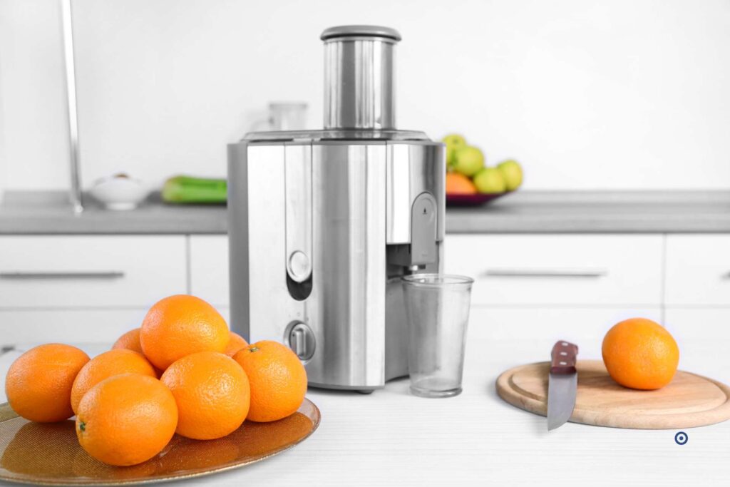 Orange juice extractor on kitchen counter